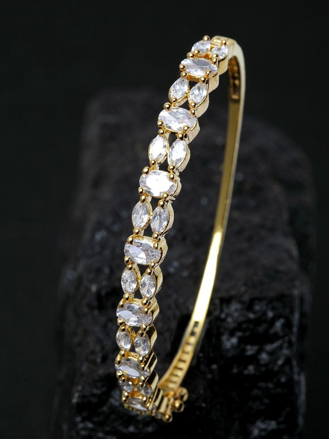 anikas creation gold-plated white american diamonds studded handcrafted bangle style bracelet