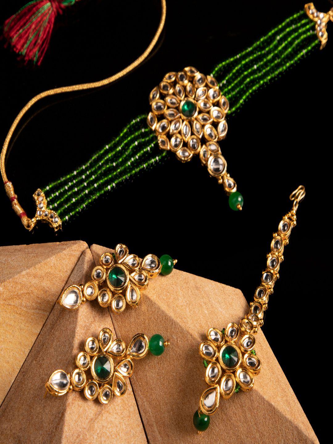 anikas creation green & gold-toned alloy gold plated hasli with earrings & maangtika