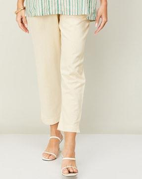 ankle-length pants with elasticated waistband
