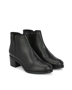 ankle-length heeled boots
