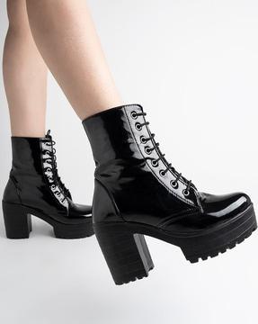 ankle-length lace-up boots