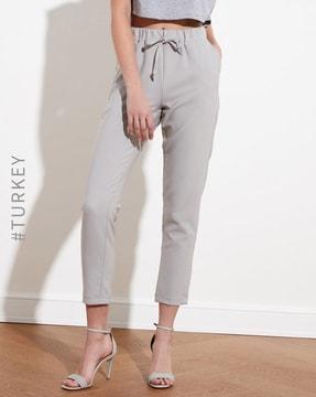 ankle-length pants with drawstring