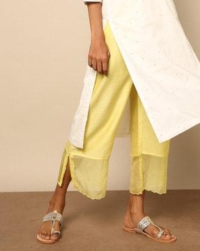 ankle-length pants with embroidered hemline