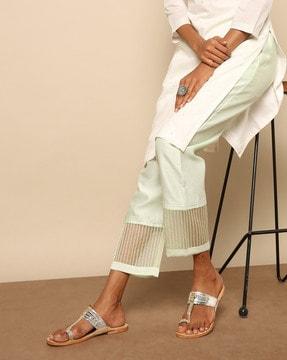 ankle-length pants with striped hems