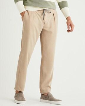 ankle-length pleated pants