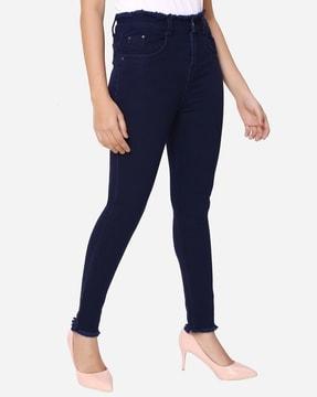 ankle-length skinny jeans with frayed hems