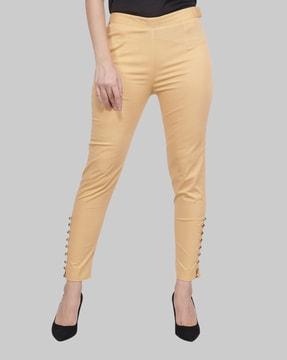 ankle-length trousers with elasticated waistband