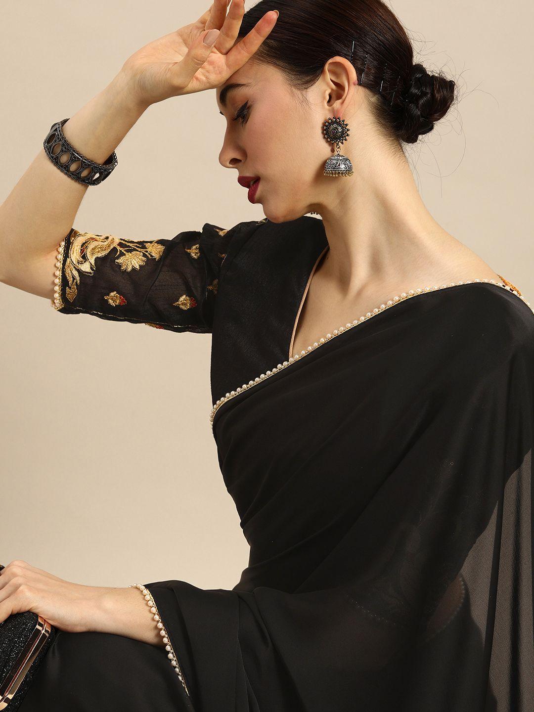 anouk black solid satin pearl border saree