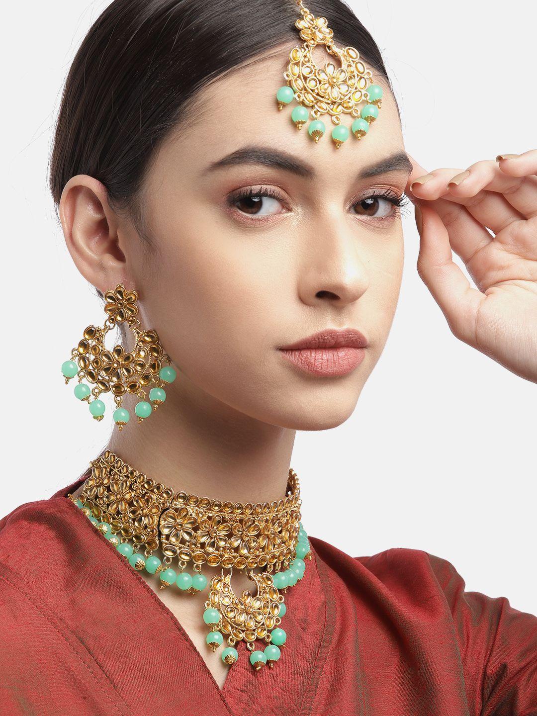 anouk gold-toned & green stone studded choke jewellery set