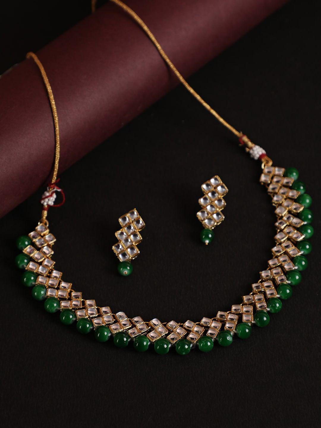 anouk green gold-plated kundan studded & beaded jewellery set