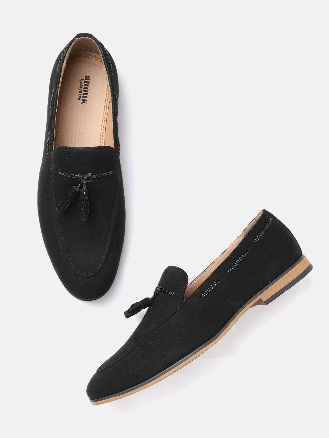 anouk men black solid tasseled handcrafted loafers