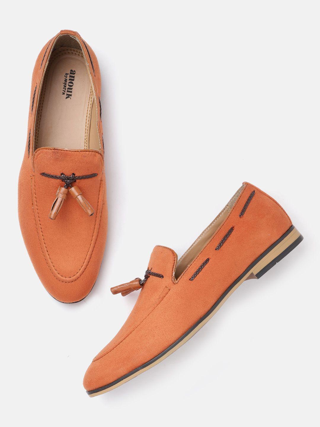 anouk men orange solid suede finish tasselled loafers