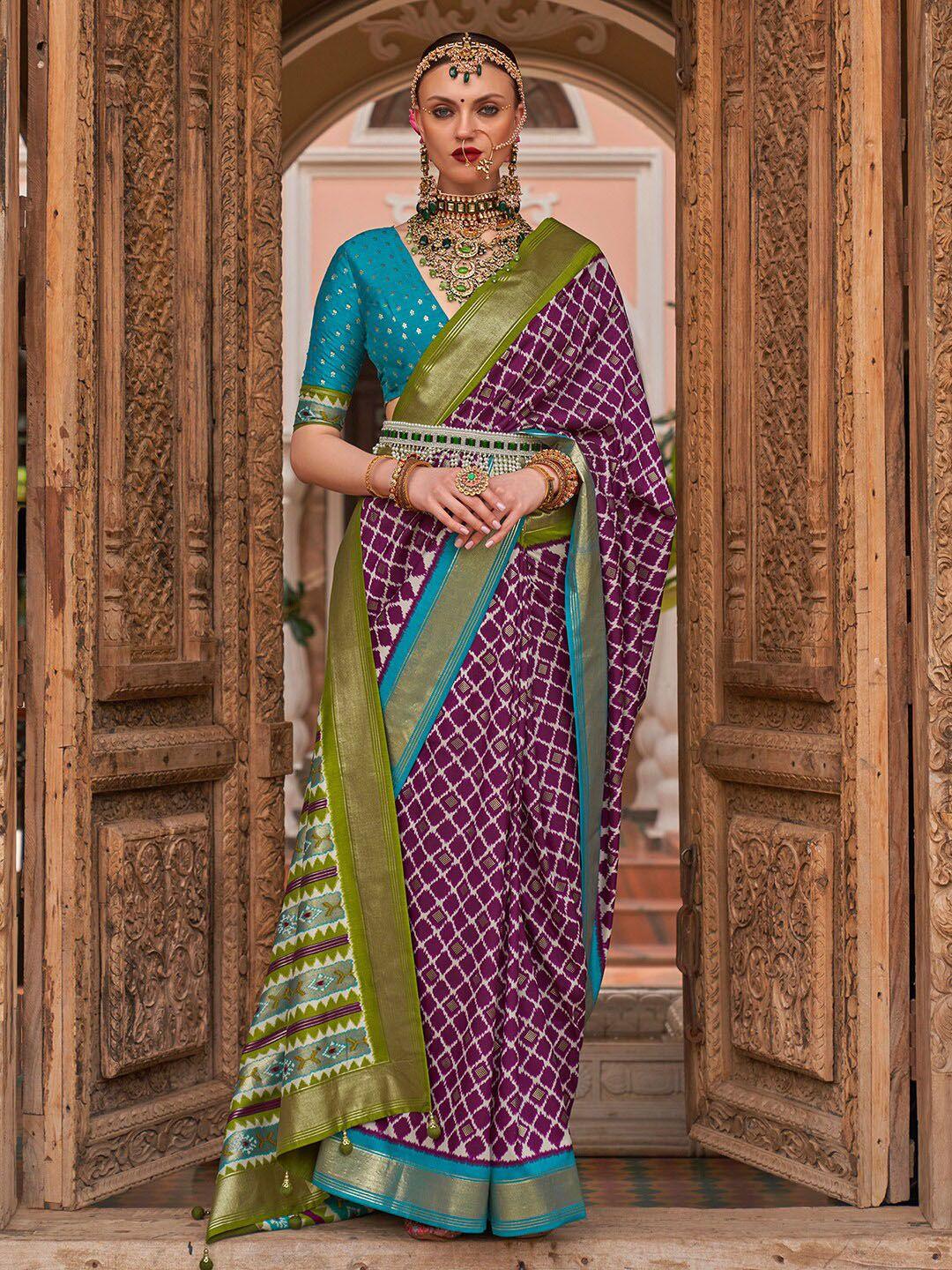 anouk purple & green woven design zari silk blend banarasi saree