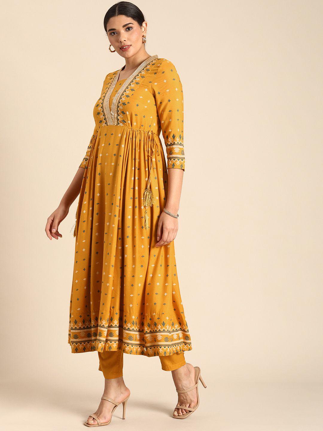 anouk women mustard yellow & green printed pleated kurta with trousers