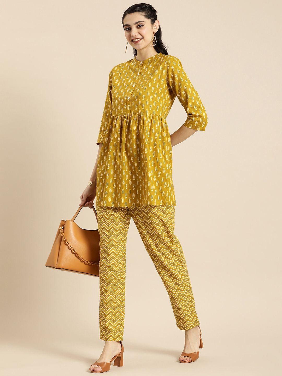 anouk women mustard yellow printed pure cotton kurta with trousers