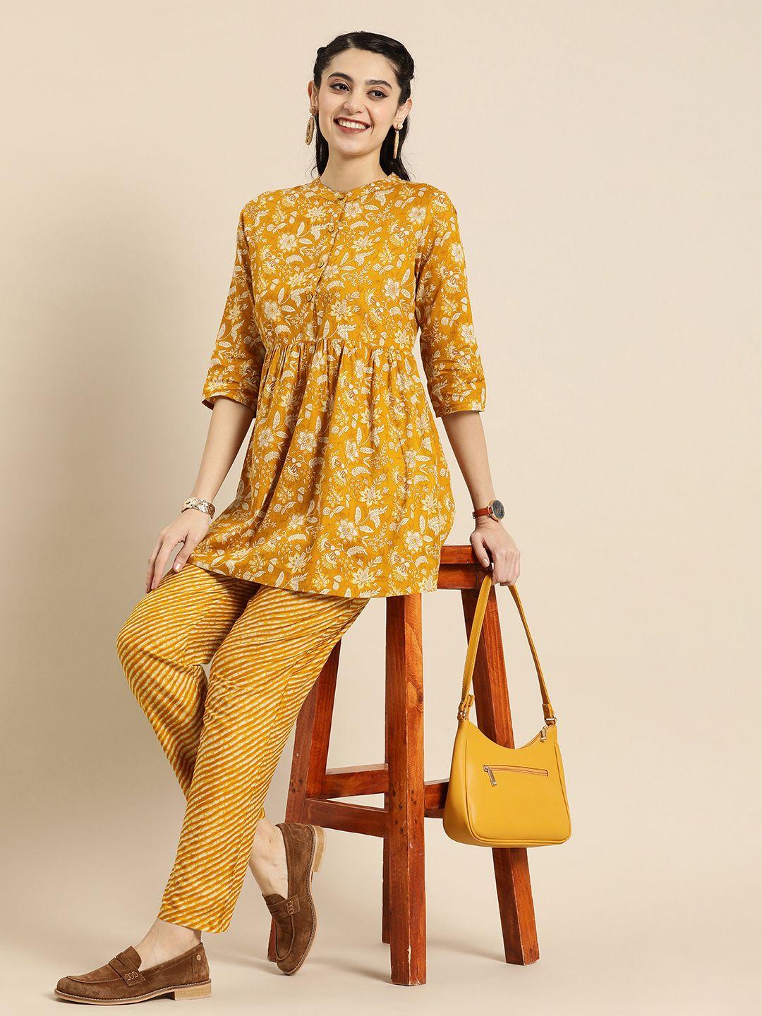 anouk women mustard yellow printed pure cotton kurta with trousers
