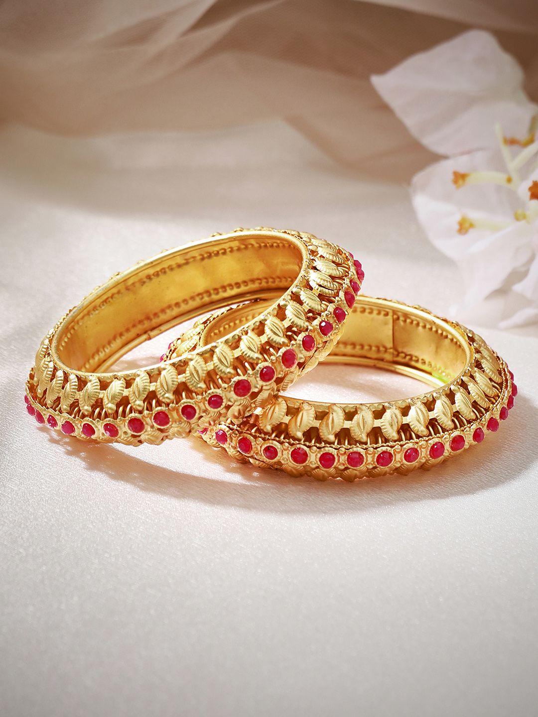 anouk women set of 2 gold plated carved and pink studded kada bangles