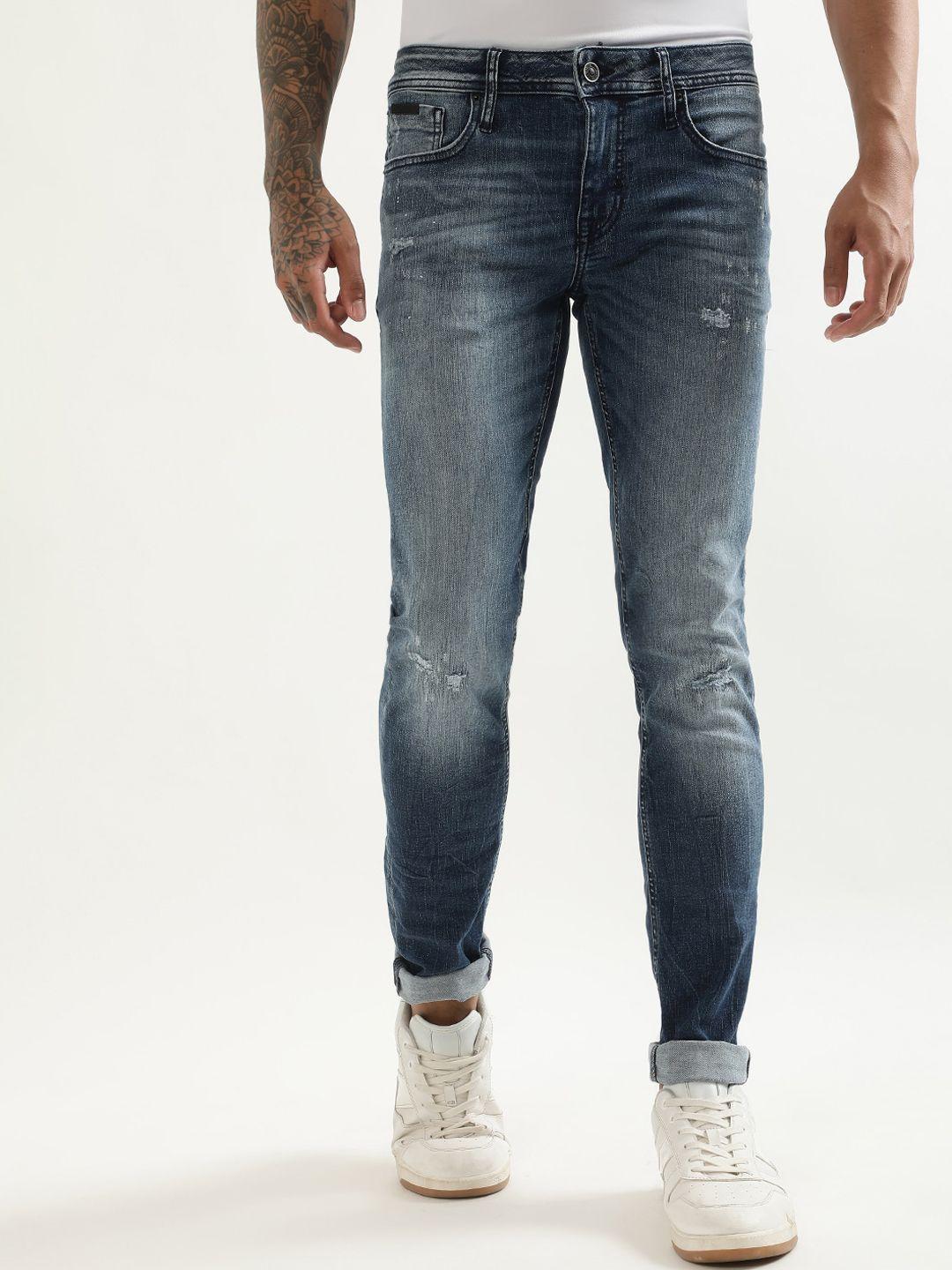 antony morato men tapered fit cotton low distress mid-rise stretchable jeans