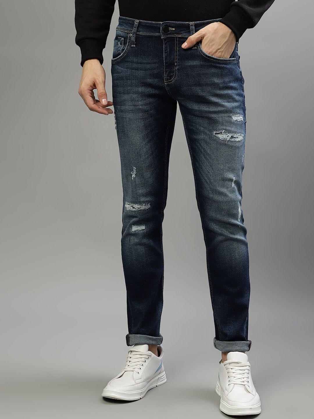 antony morato men tapered fit highly distressed mid-rise heavy fade stretchable jeans
