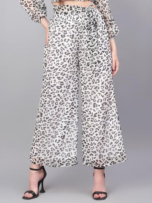 anvi be yourself white & black printed relaxed fit mid rise palazzos