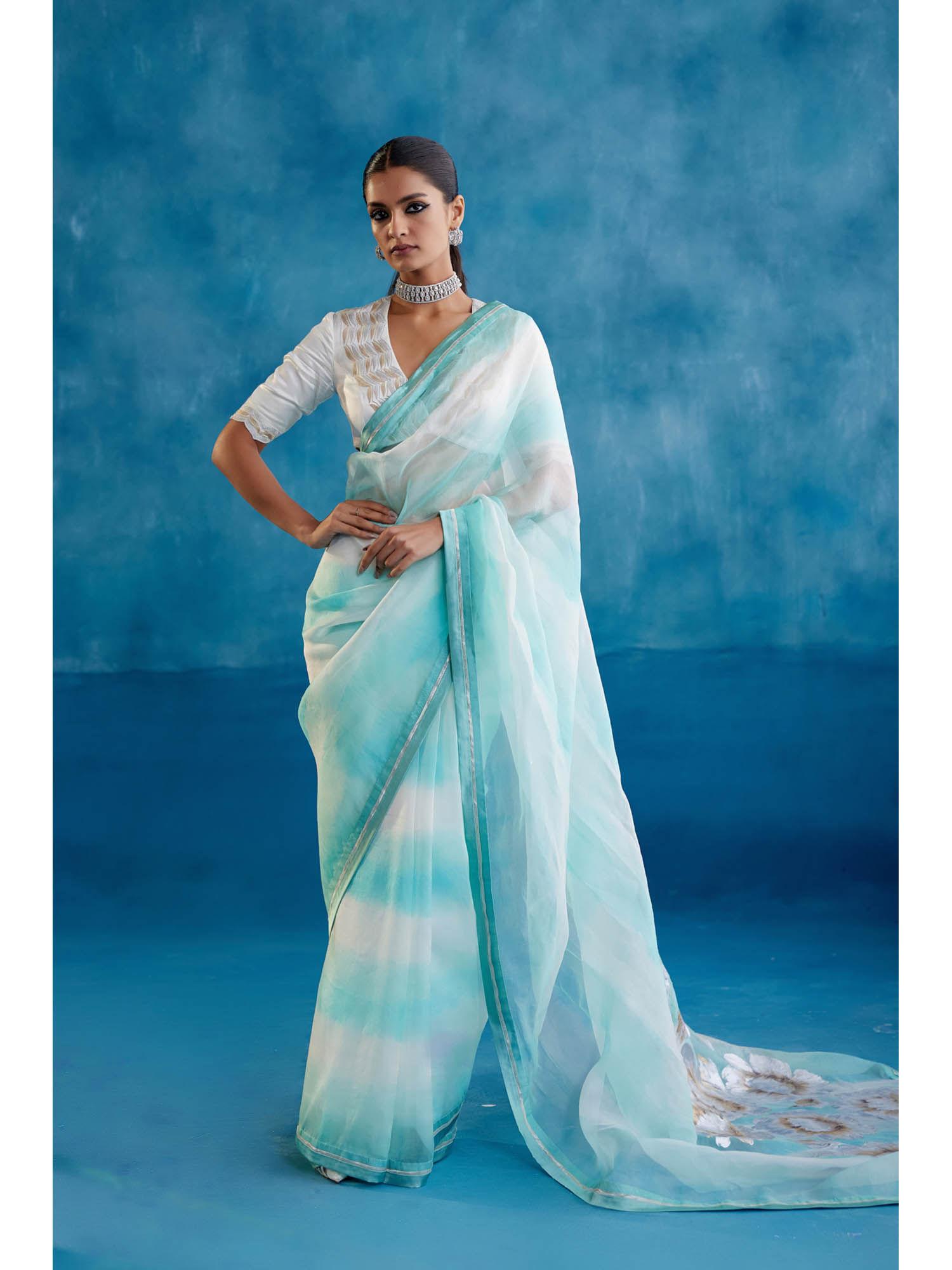 aqua blue silk organza hand painted saree with stitched blouse