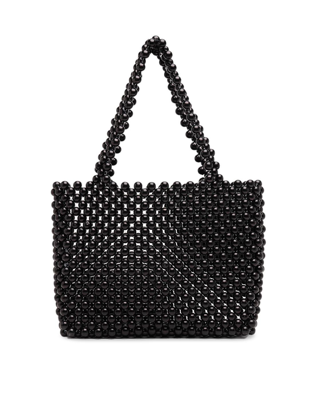 aquatan black textured structured handheld bag with tasselled
