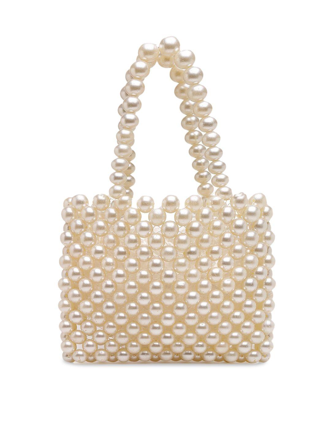 aquatan cream-coloured structured handheld bag with fringed