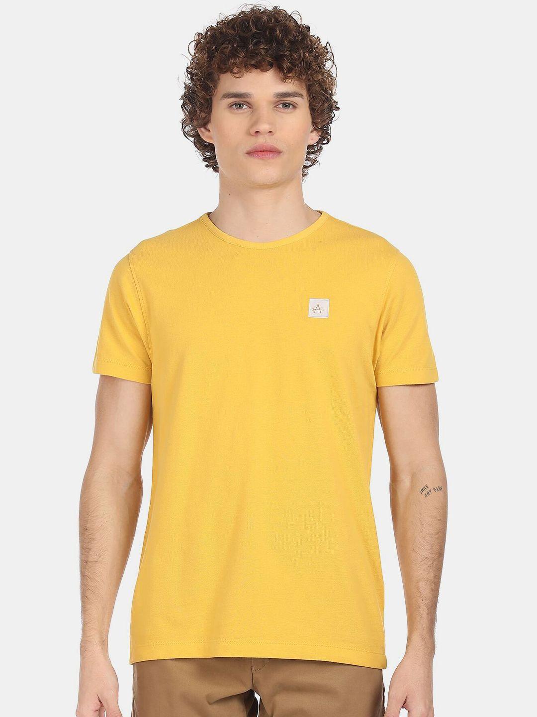 arrow men yellow solid pure cotton regular fit t-shirt