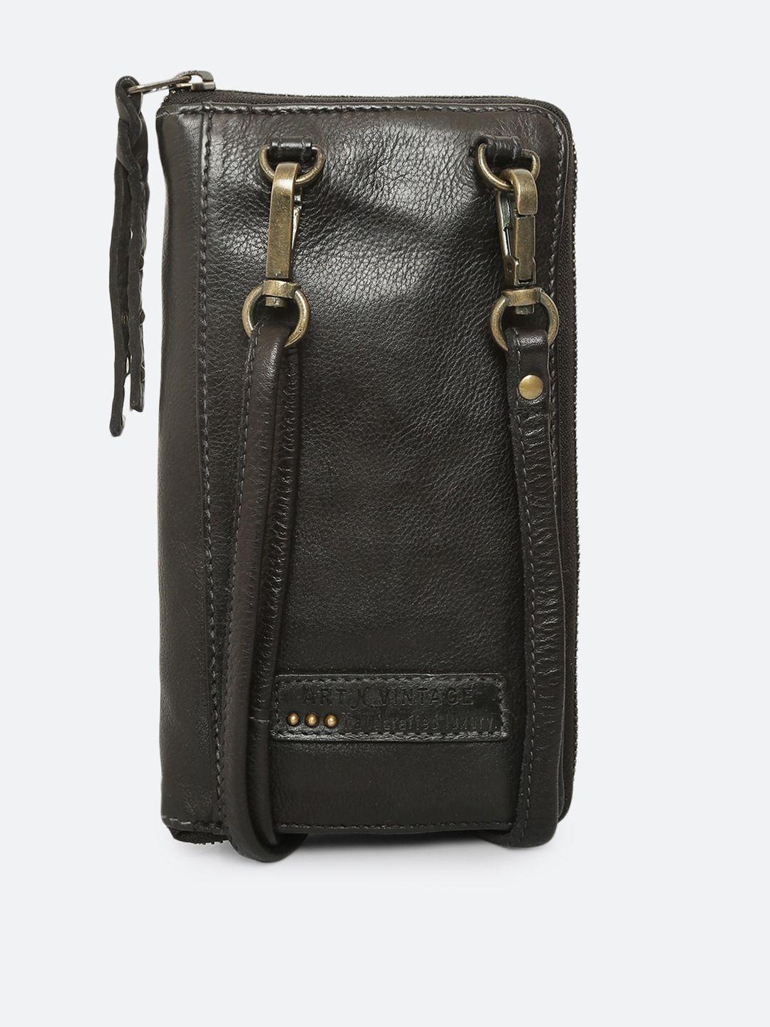 art n vintage black leather oversized structured handheld bag with tasselled
