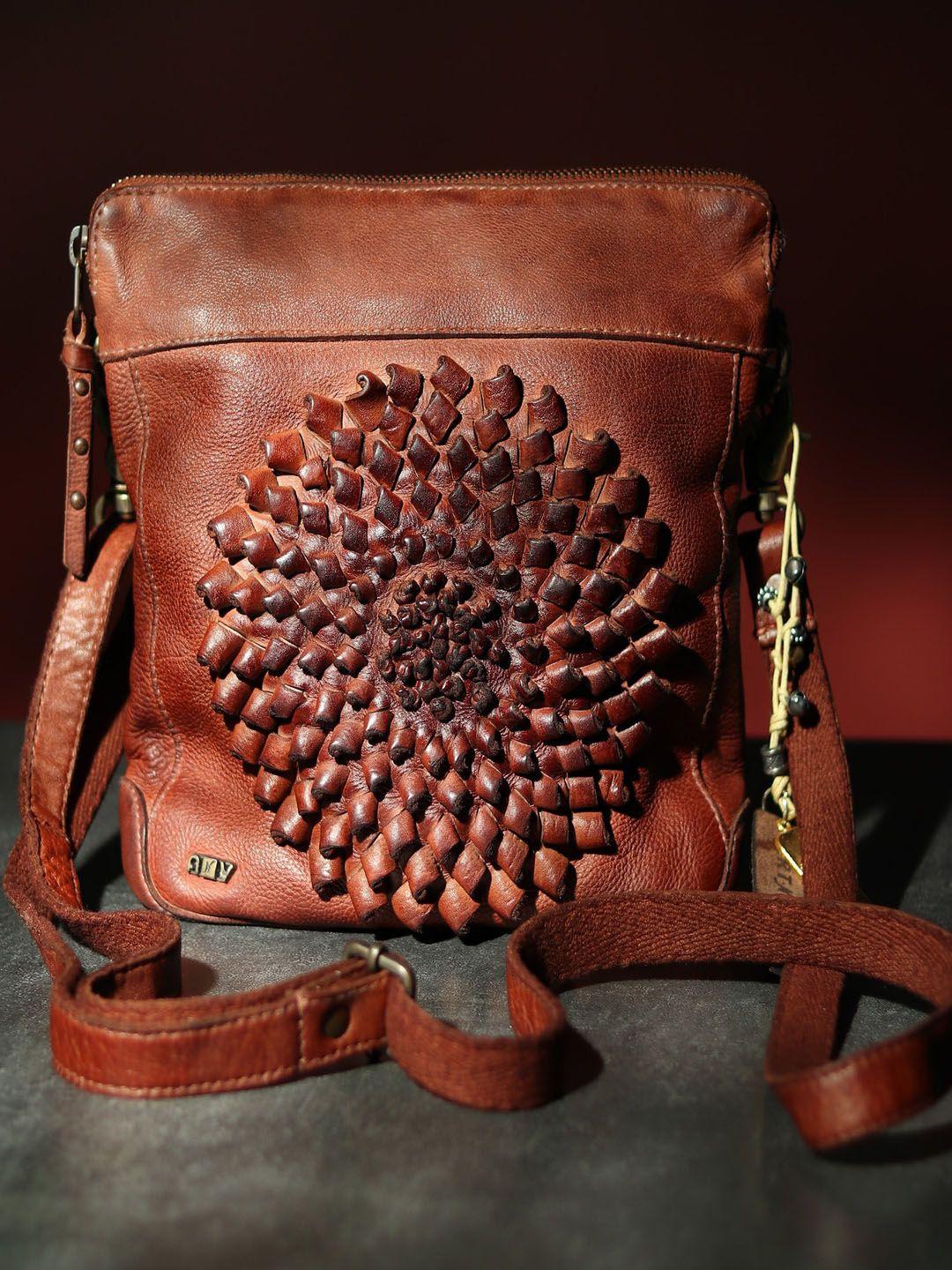 art n vintage leather structured sling bag with tasselled