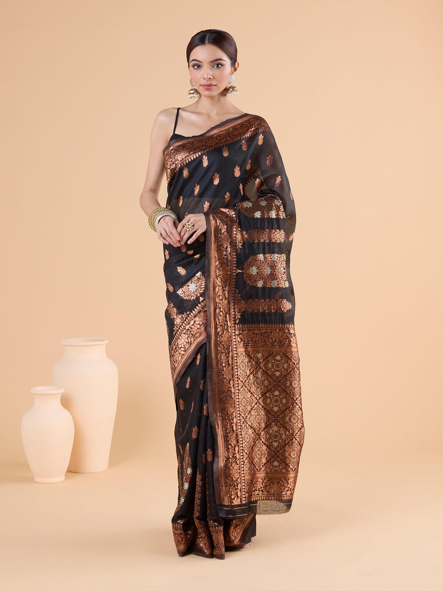 art silk contrast copper zari border and floral motif black saree with unstitched blouse