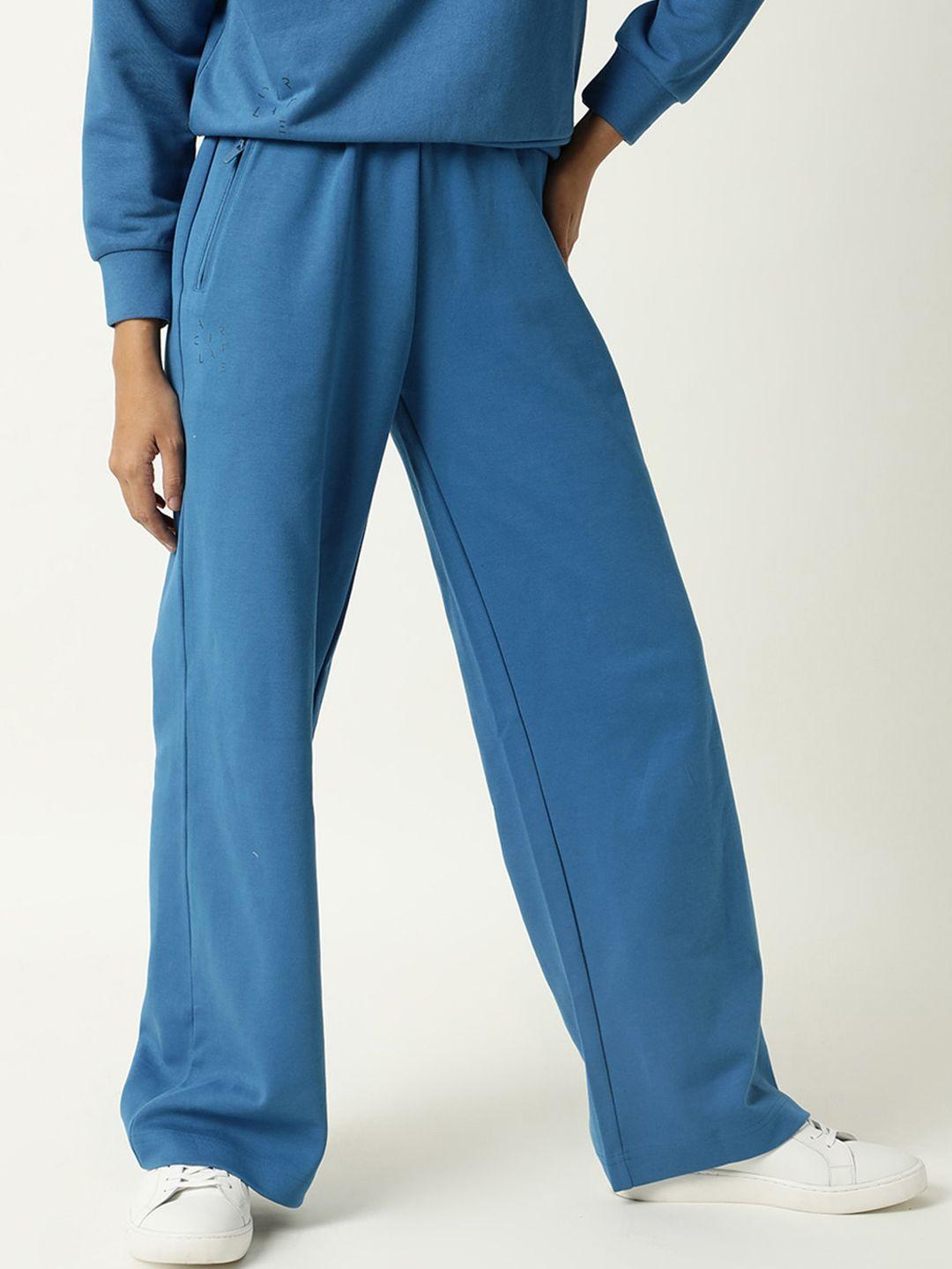 articale women blue solid slim-fit track pants