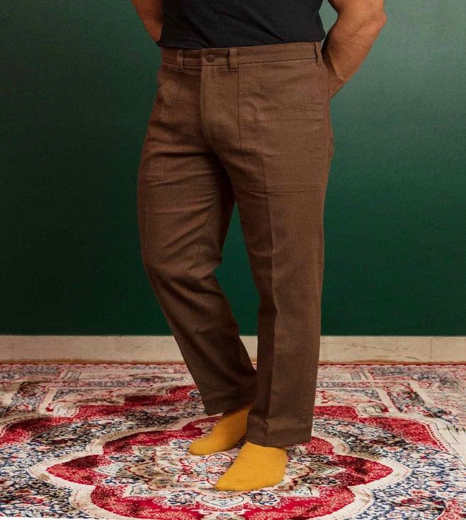 artless muddy brown trousers