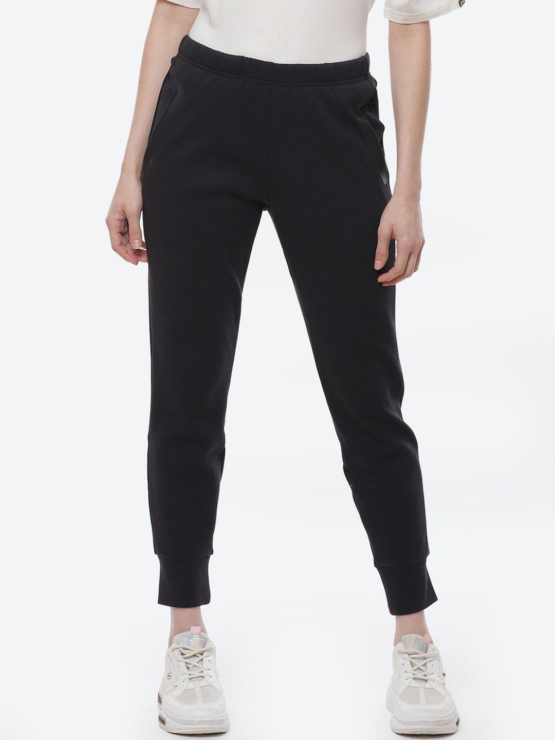 asics women black tech knit tapered solid joggers