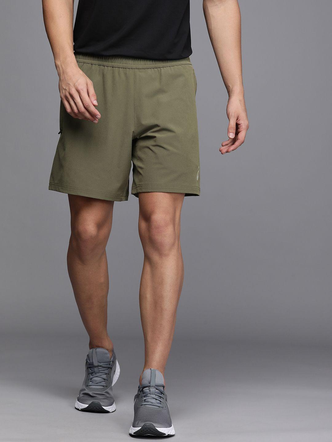 asics men olive green solid mid rise above knee inner woven running shorts