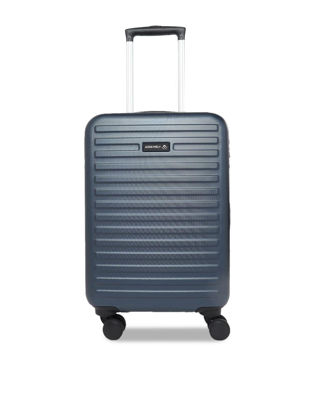 assembly blue textured hard-sided trolley suitcase