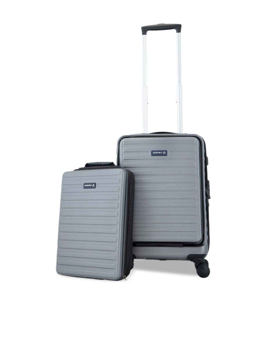 assembly set of 2 textured hard sided small trolley suitcase & laptop backpack