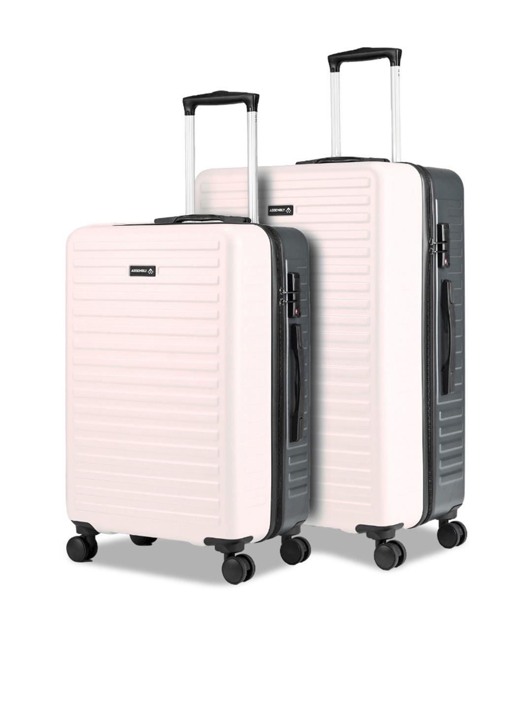assembly set of 2 textured hard-sided trolley suitcases
