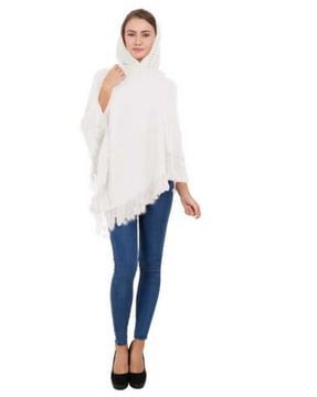 asymmetrical poncho with tassels