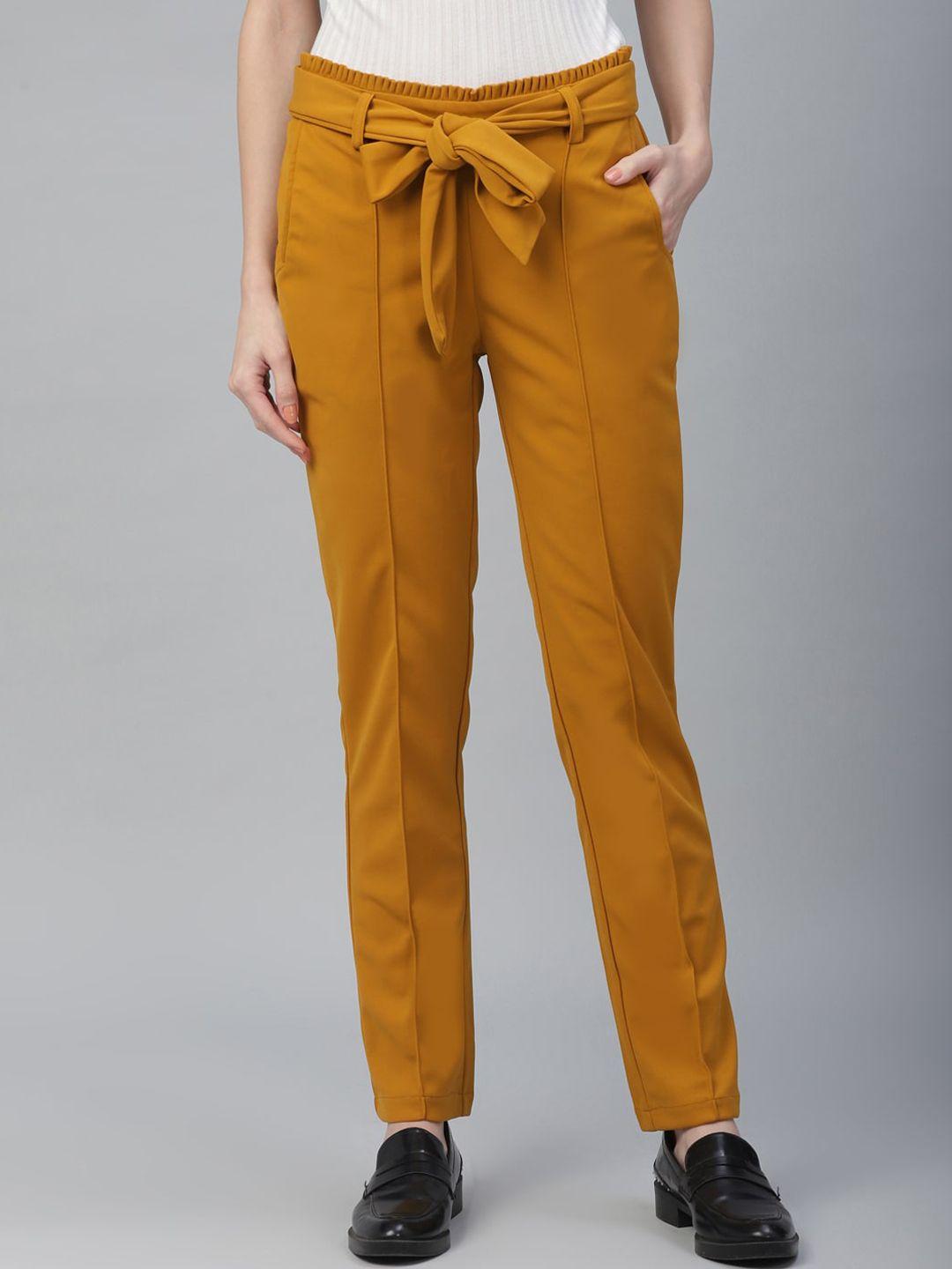 athena women mustard yellow regular fit solid peg trousers