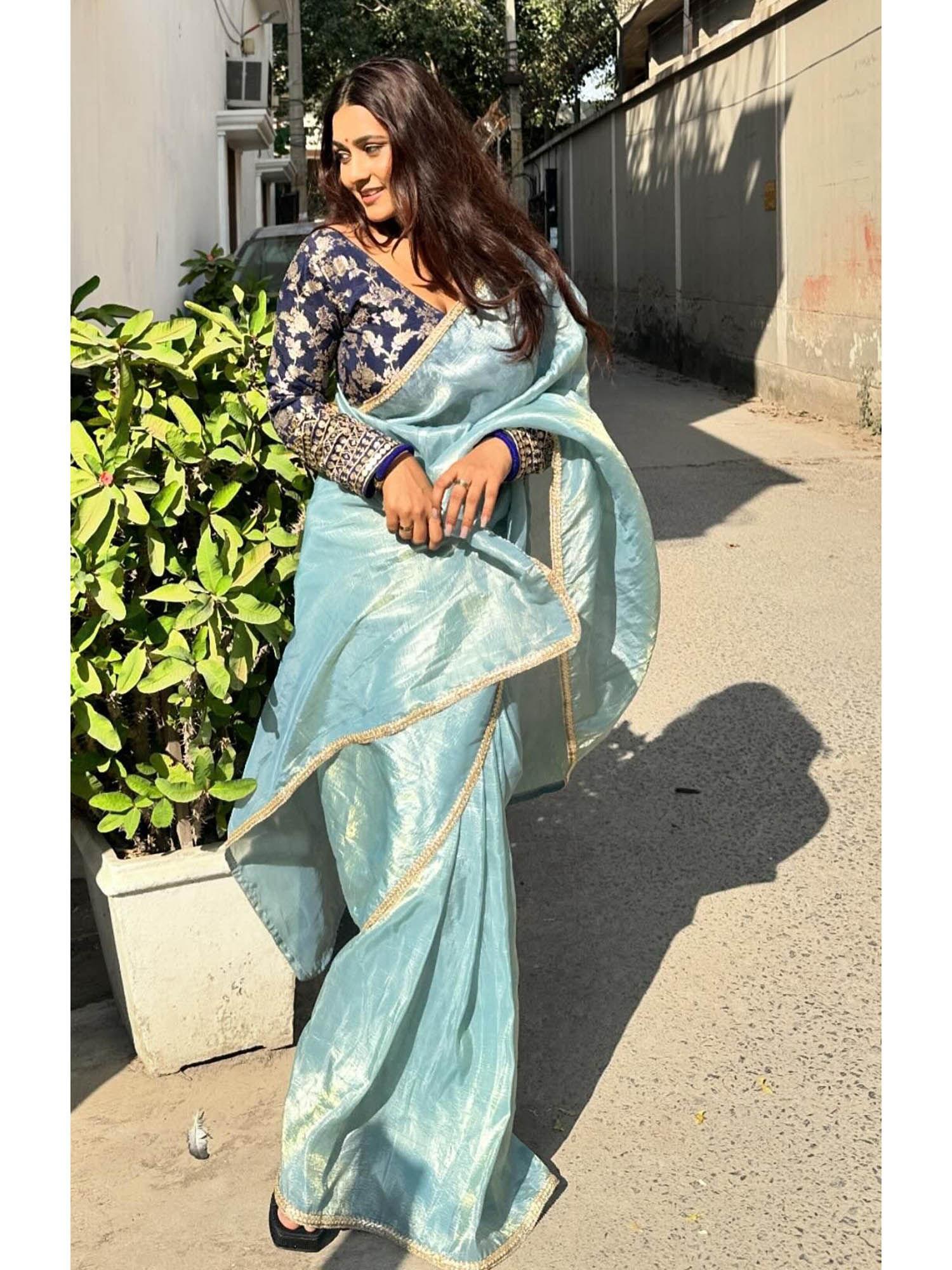 attractive blue fendy silk saree with stitched blouse