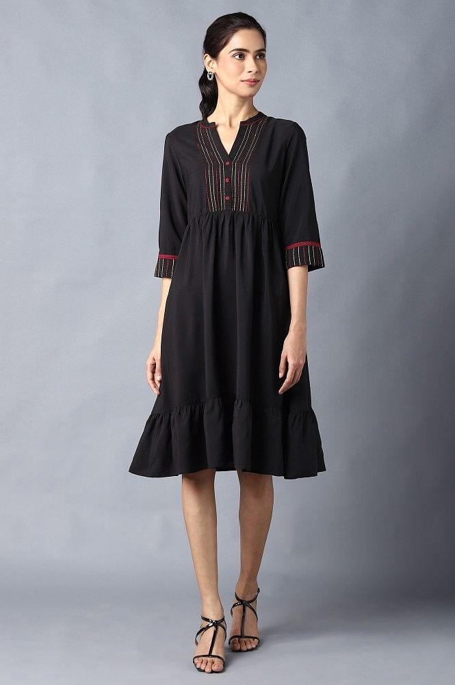 aure collection by aurelia black circular embroidered dress