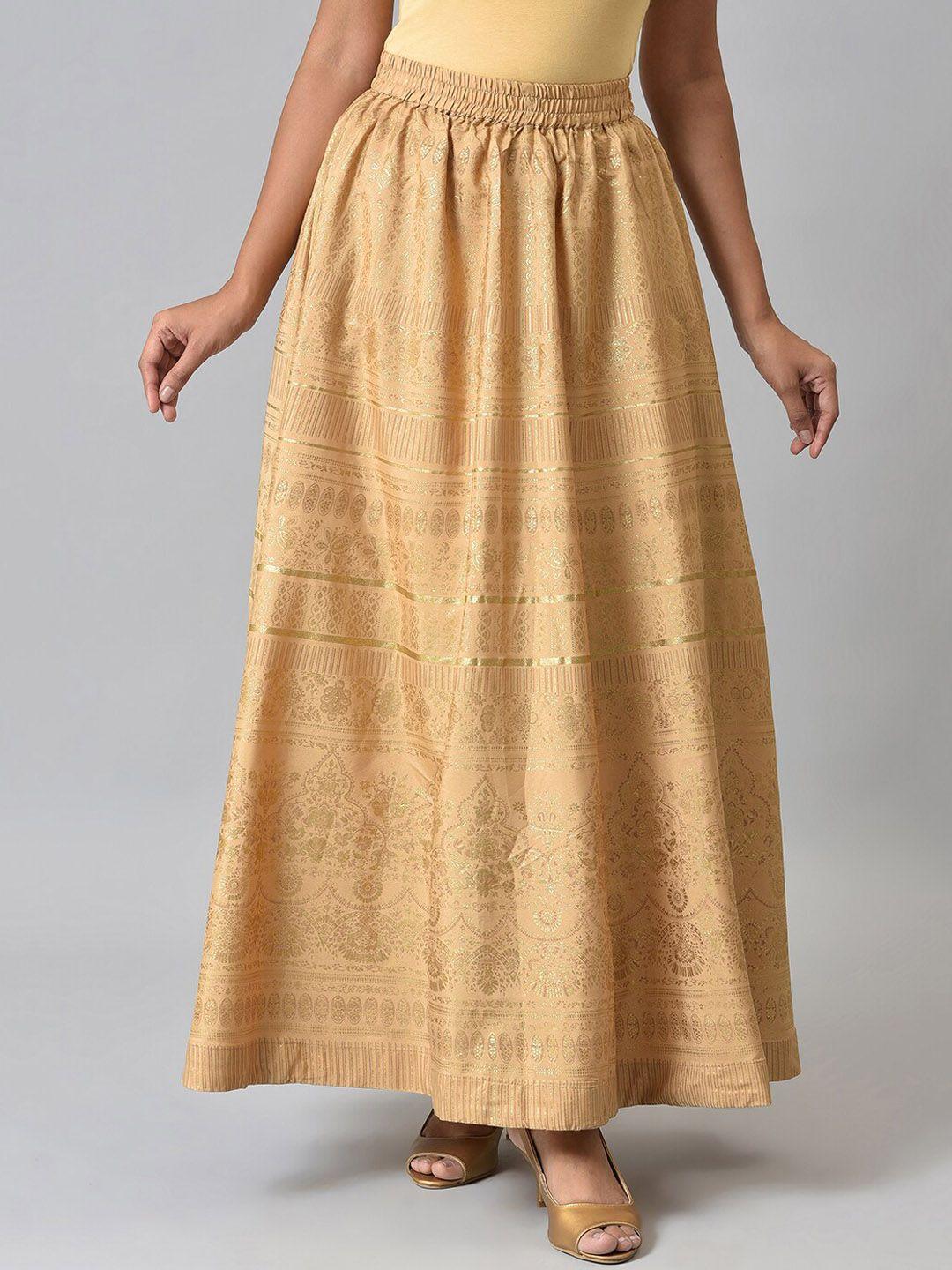 aurelia women golden printed flared maxi skirts