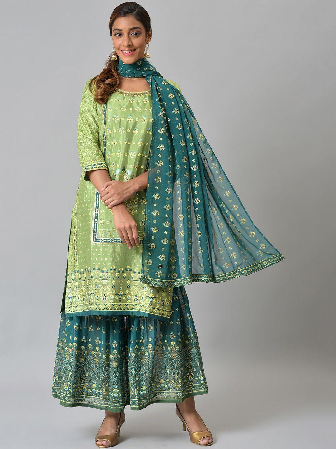 aurelia women green foil printed liva kurta with sharara and dupatta