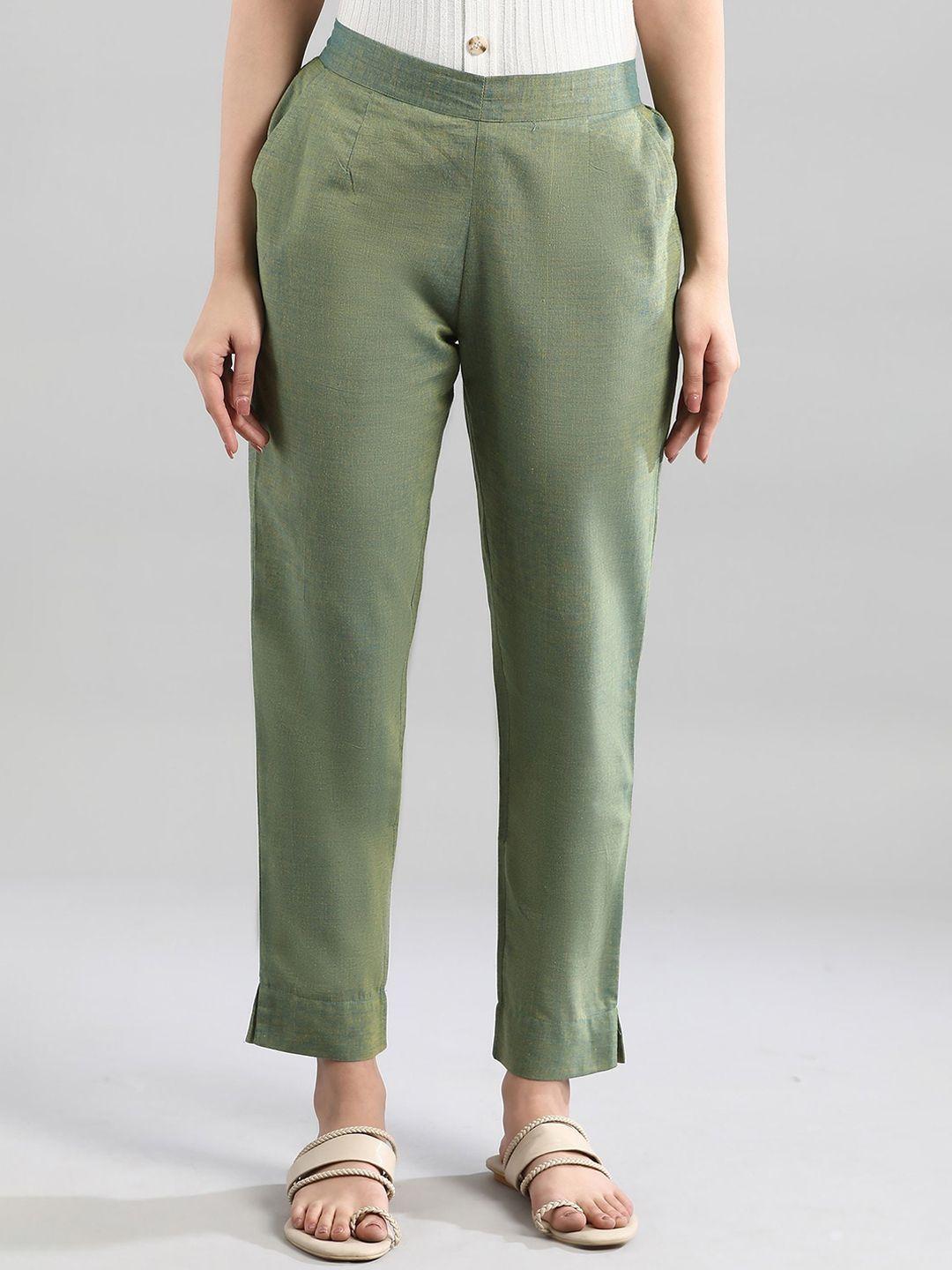 aurelia women green regular fit solid cotton trousers