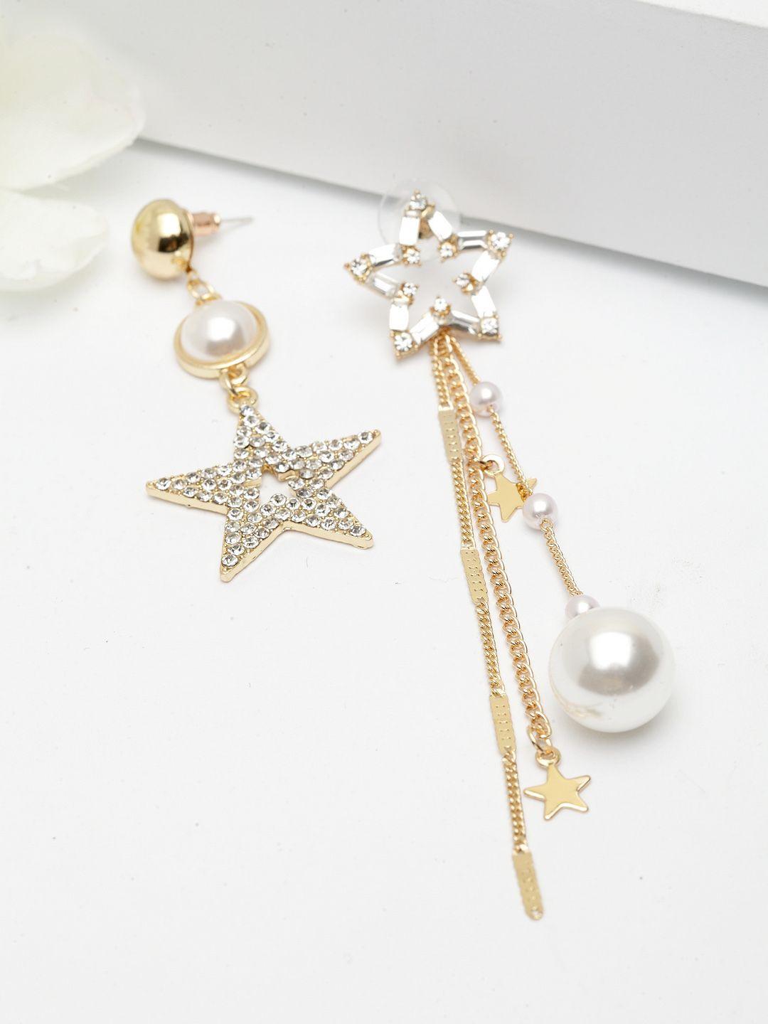avant-garde paris gold-plated star shaped drop earrings