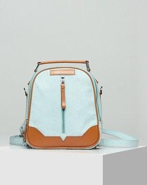 backpack with convertible sling strap