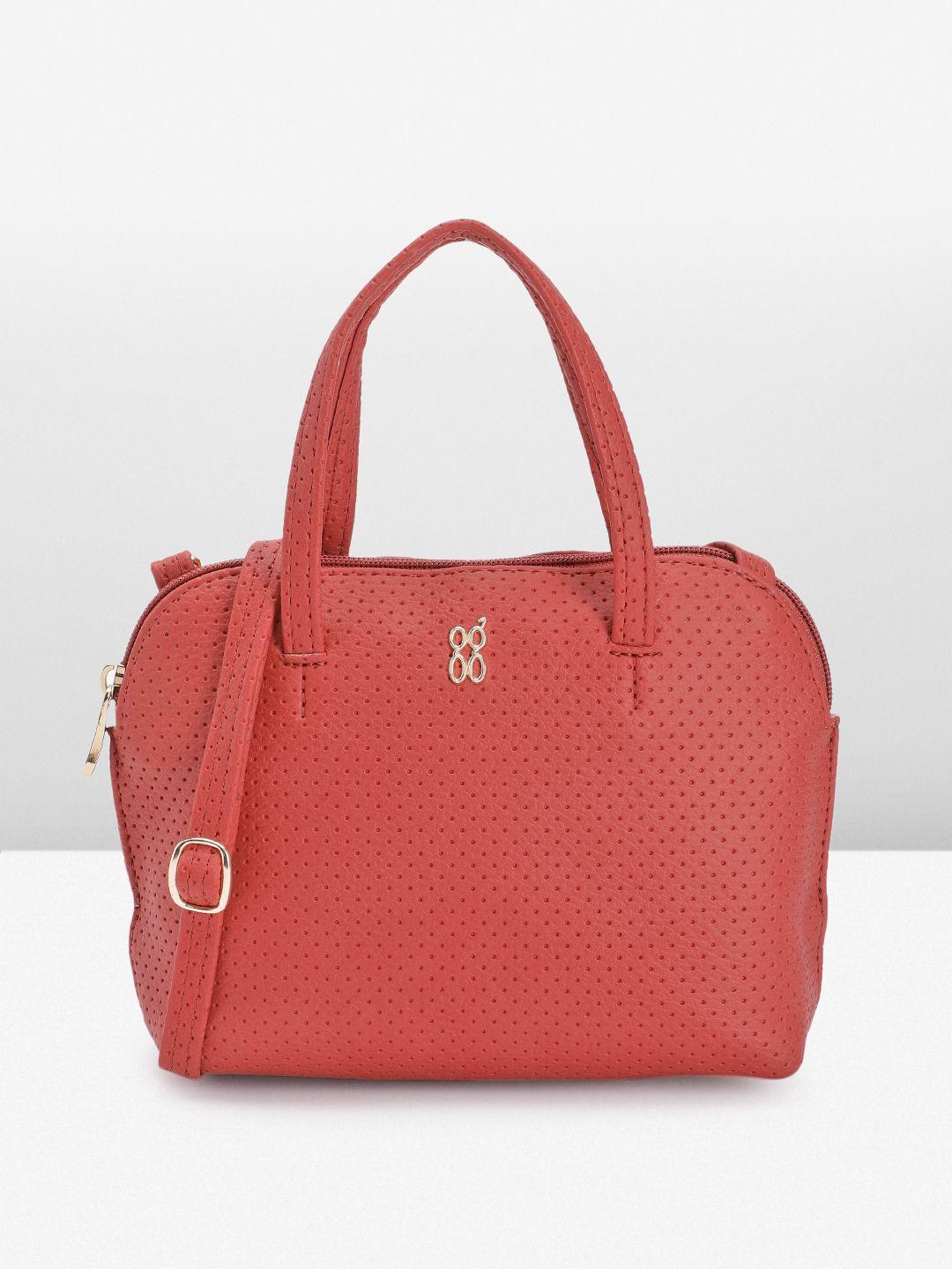 baggit geometric textured sling bag