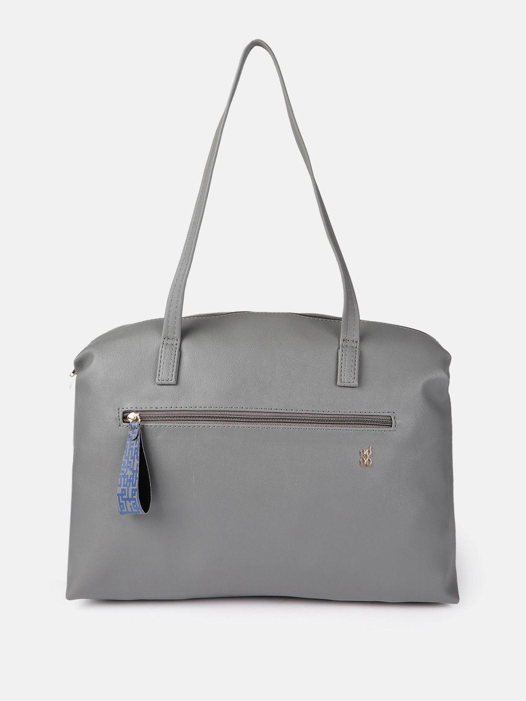 baggit grey solid regular structured shoulder bag with tasselled detail