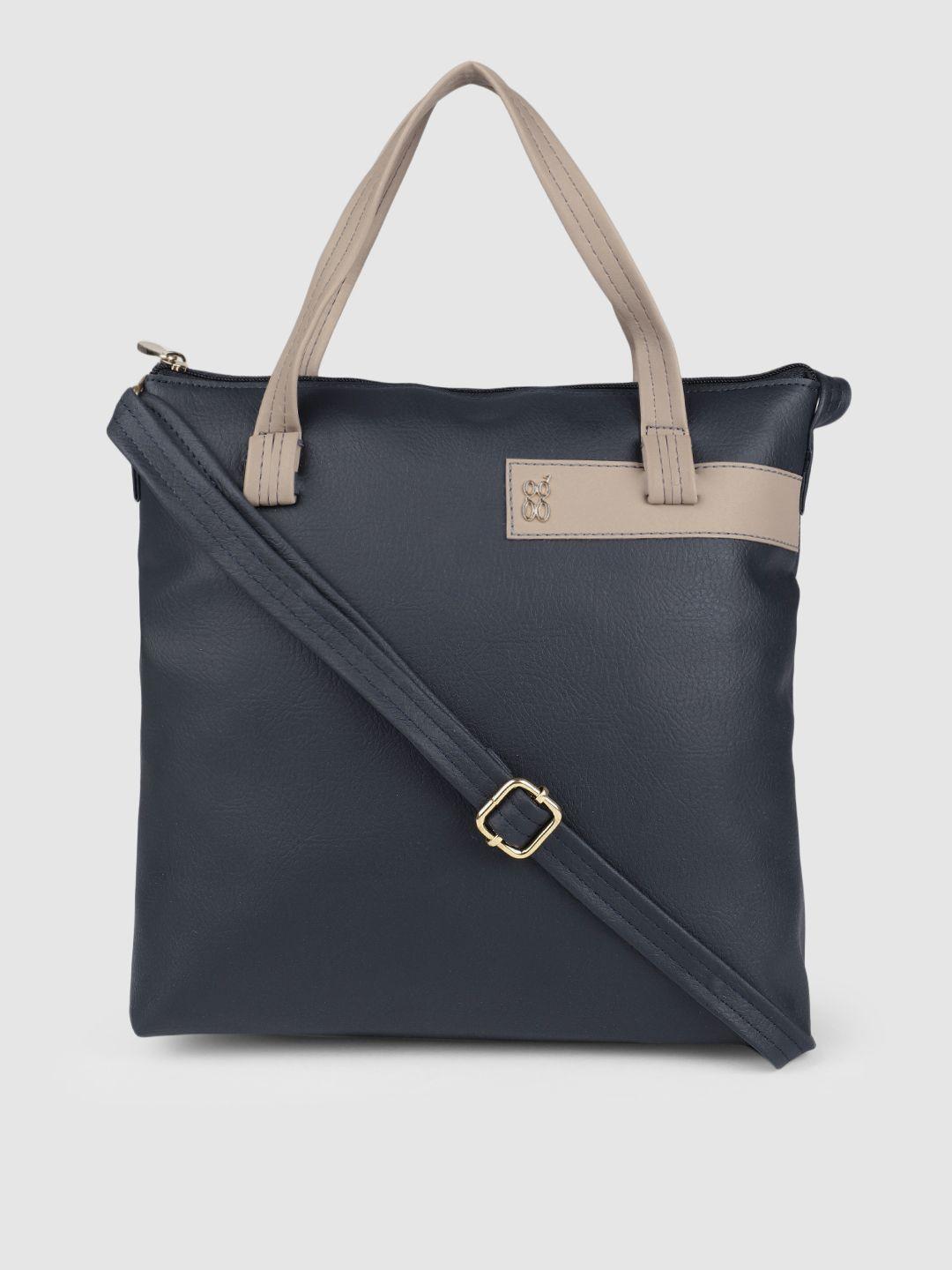 baggit navy blue solid sling bag